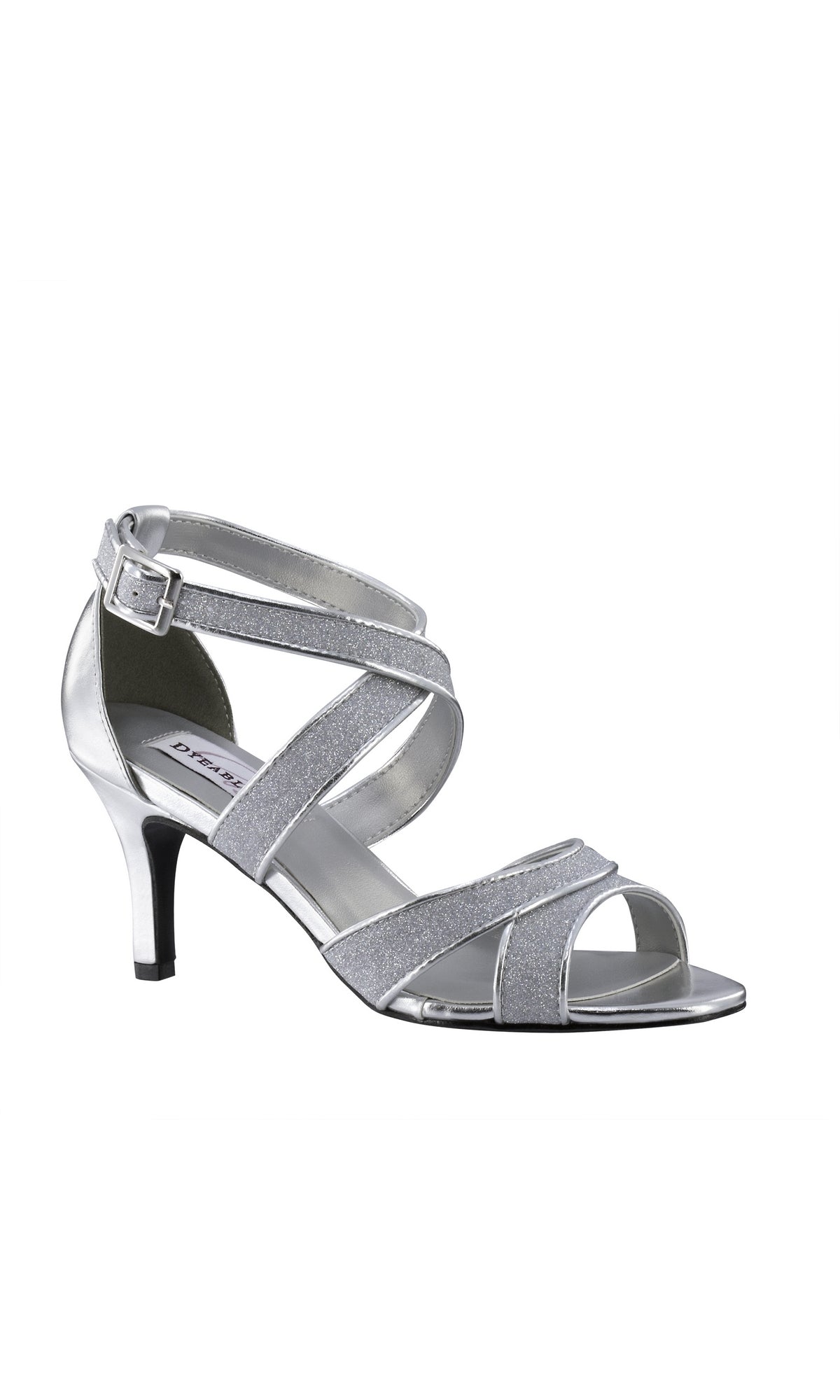 The Amber Silver Prom Shoes by Touch Ups 54716 are open-toe high heels with glittery crisscross straps, an ankle buckle, and a 2.75-inch heel—ideal for prom. Shown on a white background.